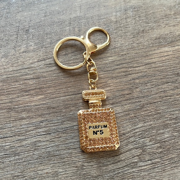 Accessories - NWOT Perfume Bottle Bling Keychain- Bronze